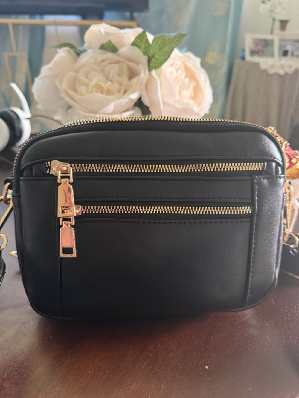 Compact Black Crossbody Bag with Gold Zippers
